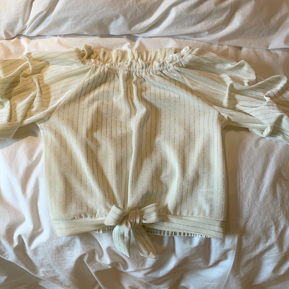 White ruffle shirt